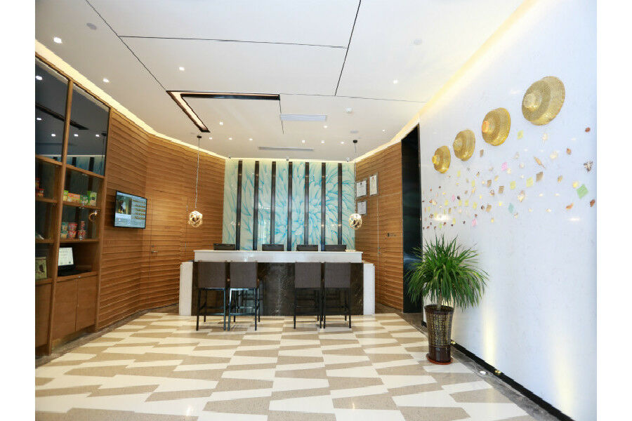锦江都城酒店海南省政府日月广场免税店 Хайкоу Экстерьер фото